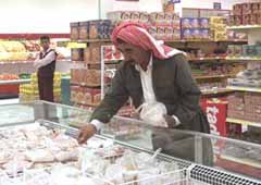 A Kurdish man shops at Mazi supermarket in the northern Iraqi city of Dohuk